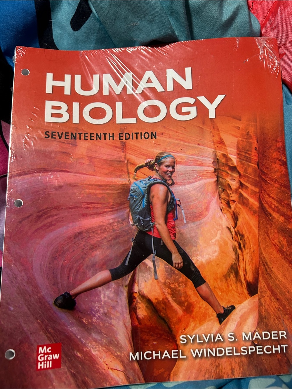 McGraw Hill Human Biology Textbook - Red/Orange Cover